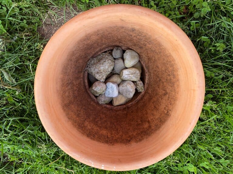 stones bottom flower pot