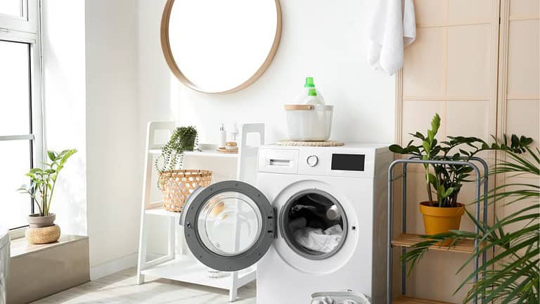 bathroom with modern washing machine