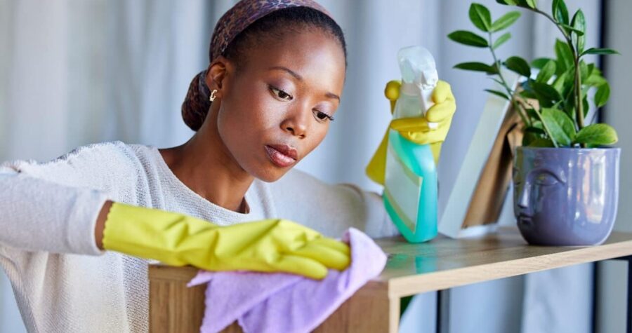 Woman cleaning dusting furniture, wipe, clean