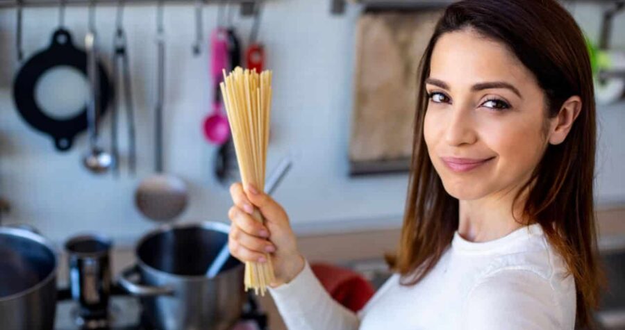 woman holding pasta