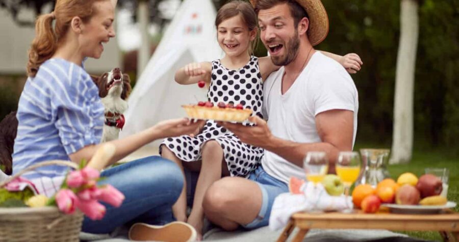 Family picnic in the backyard on beautiful day