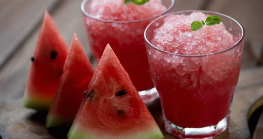 Glasses,With,Watermelon,Granitas,And,Fresh,Watermelon,Slices