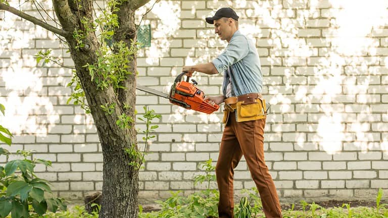 a man with a chainsaw
