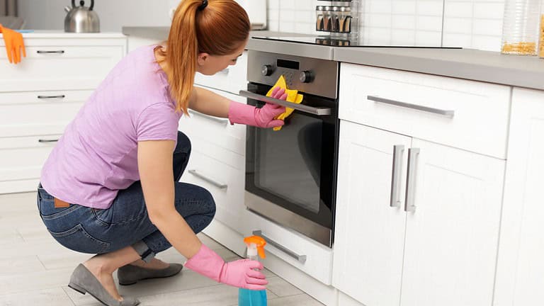 woman cleaning oven, cleaning, oven, household chores