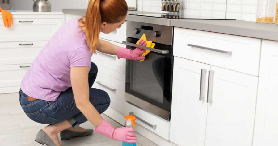 woman cleaning oven, cleaning, oven, household chores