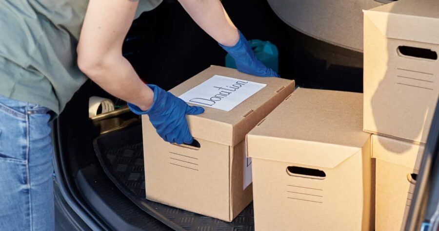 Donation box in car trunk for safe transportation into donation centers