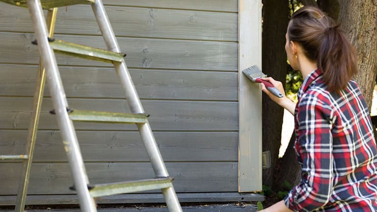 painting house, woman painting, curb appeal
