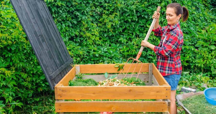 woman composting, composting, sustainability, eco-friendly