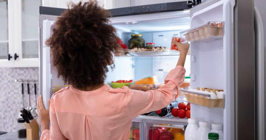 woman in fridge, food in fridge, refrigerator