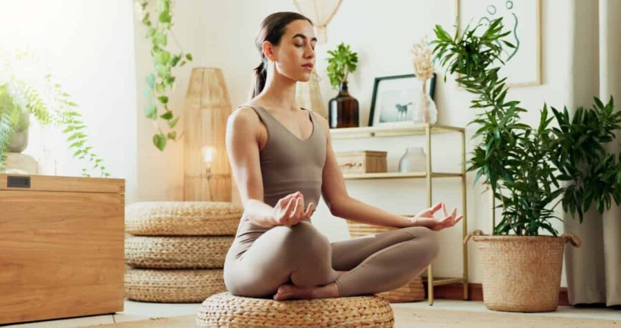 woman meditating, meditation, zen, calm, wellness
