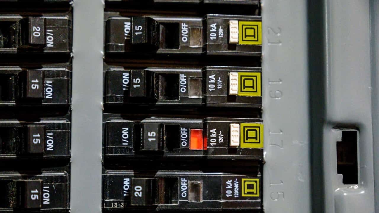 Electrical panel with a tripped circuit breaker switch