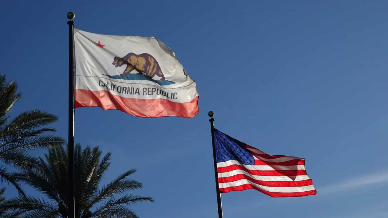 California state flag against blue sky