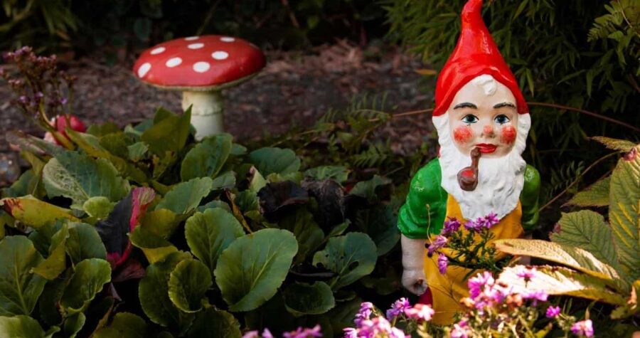 Over decorated garden too many yard figurines cluttered outdoor space