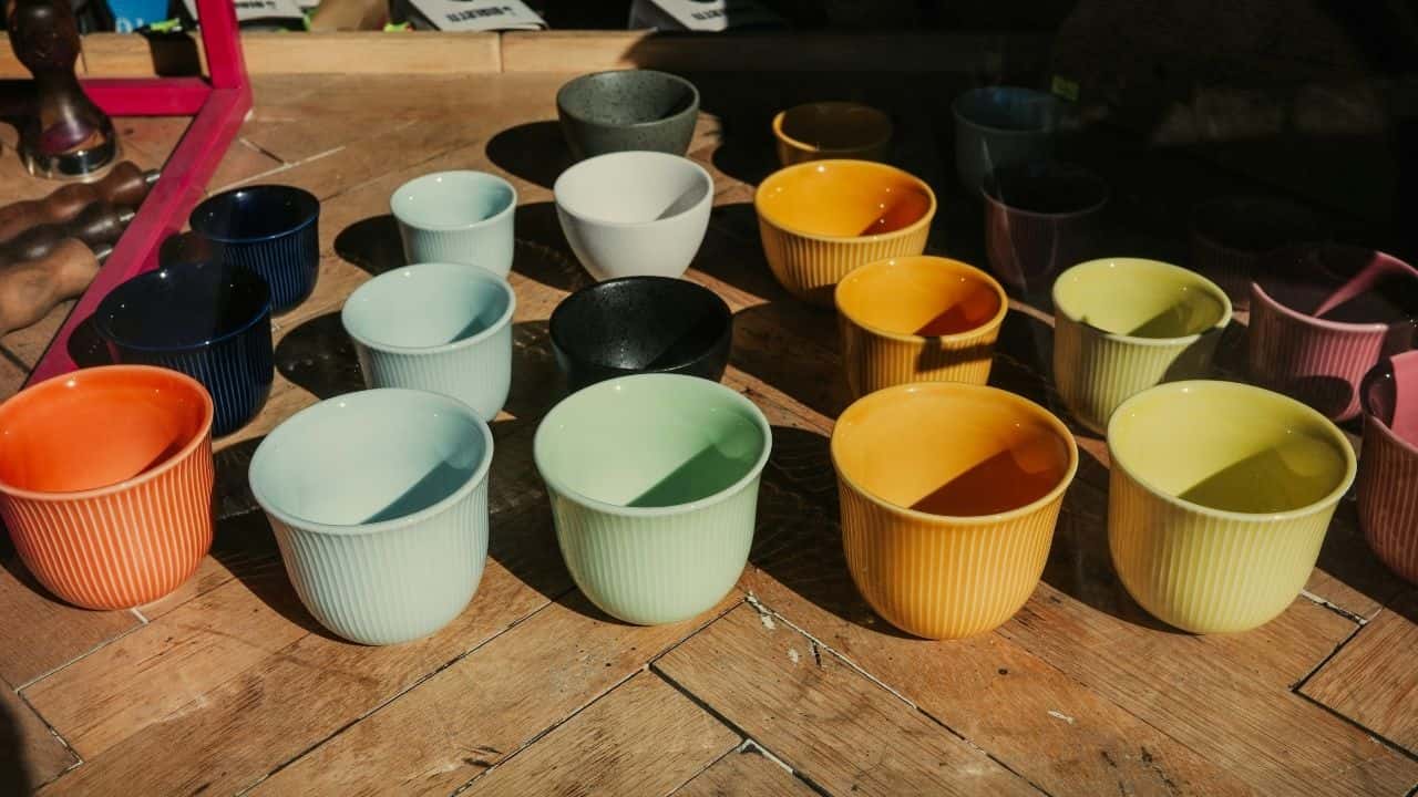 Paint large plain pots in bright hues to add artful flair