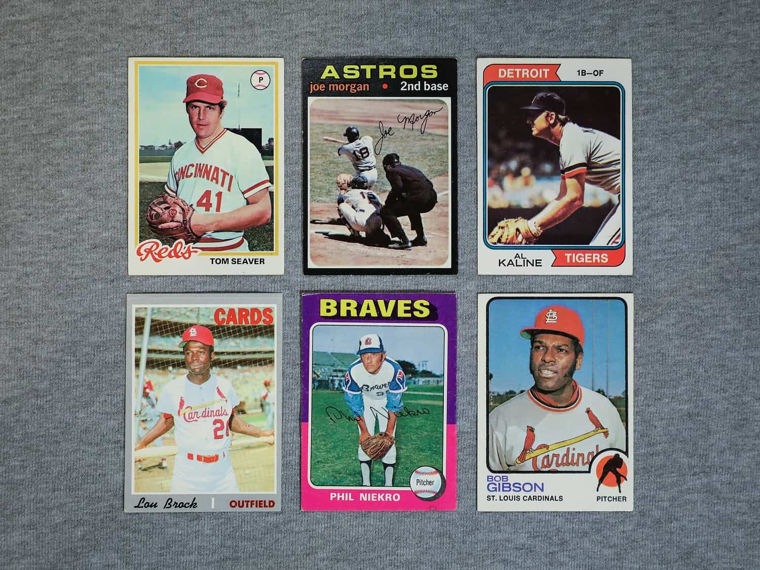 The image shows six vintage baseball trading cards featuring legendary players