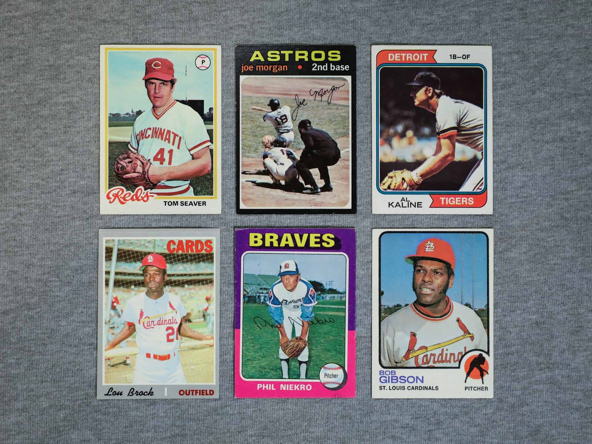 The image shows six vintage baseball trading cards featuring legendary players