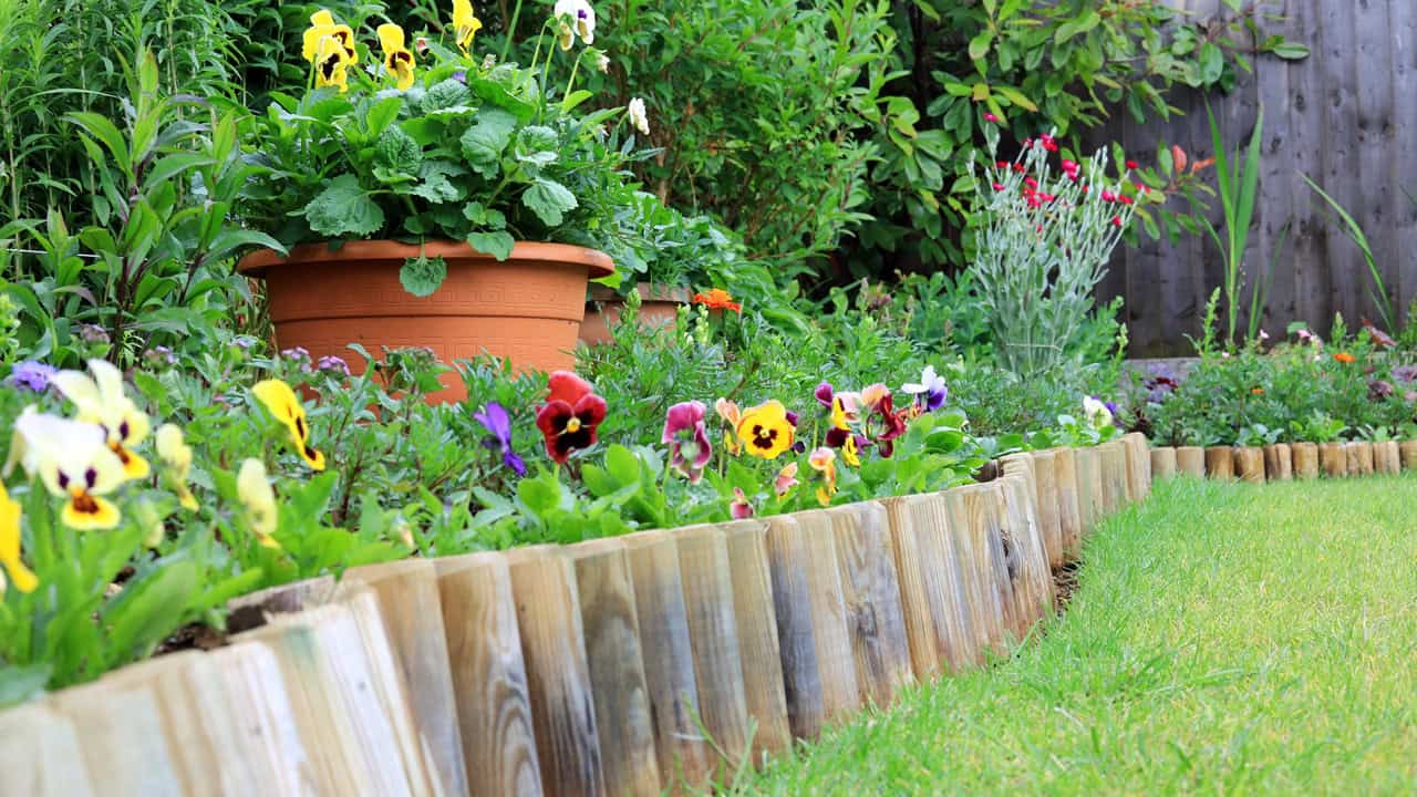 log edging along flower beds