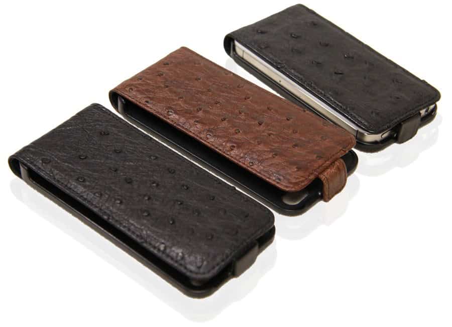 Three leather-textured phone cases, two black and one brown, arranged on a white surface, flip cover design, sleek and protective style
