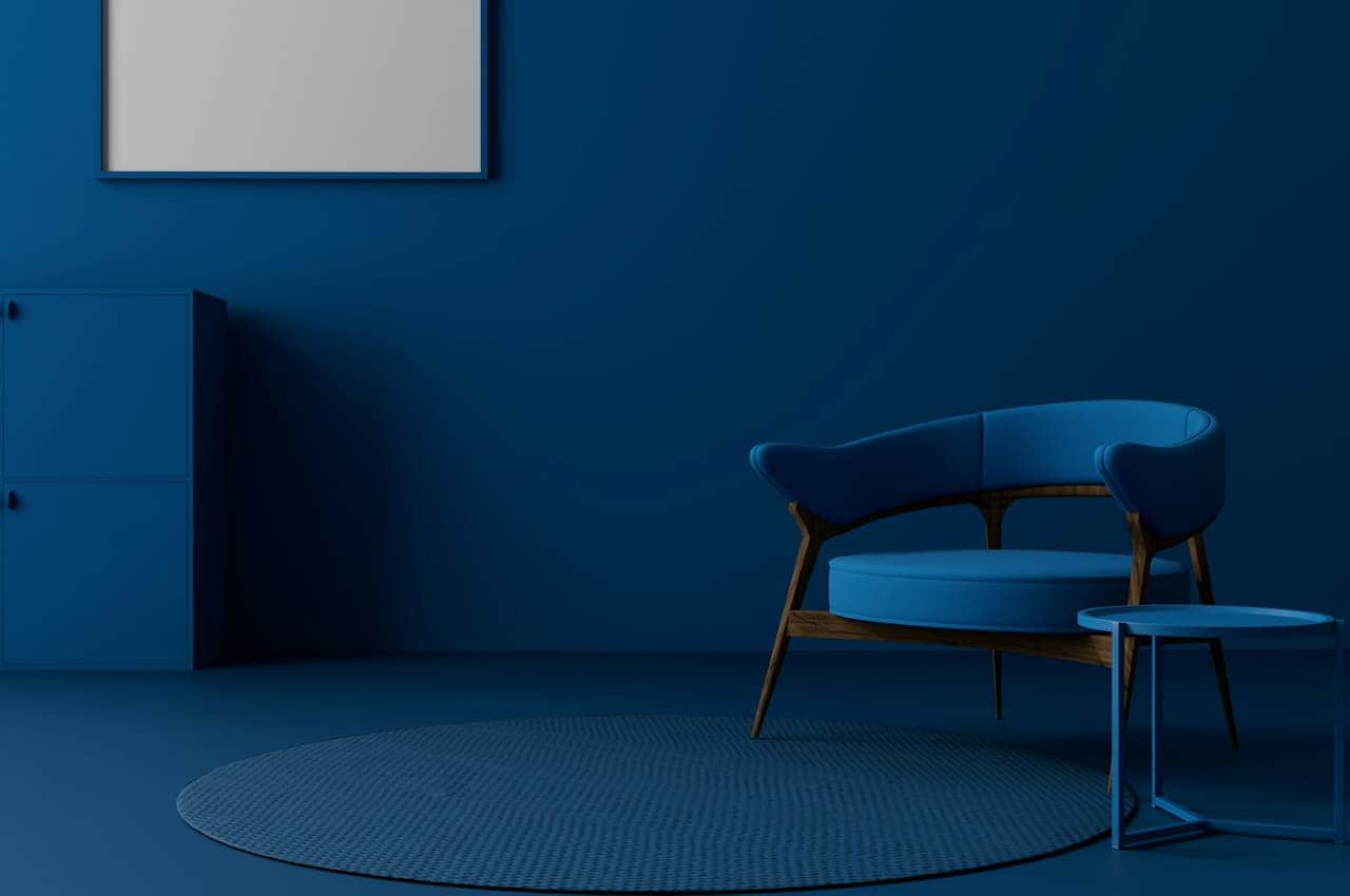 Modern living space, cozy room with minimalist decor, decorative plants by the wall, clean and organized space, calm and serene ambiance, stylish gray ottoman, well-lit room with soft natural light, indoor plant in a decorative pot, simple elegant design