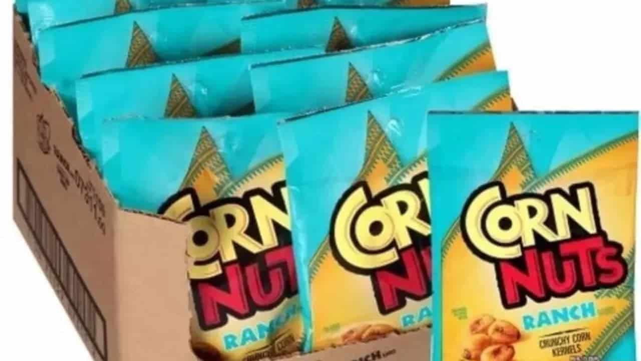 Cardboard display box containing multiple packages of Ranch-flavored Corn Nuts snacks with turquoise packaging and yellow-red logo design