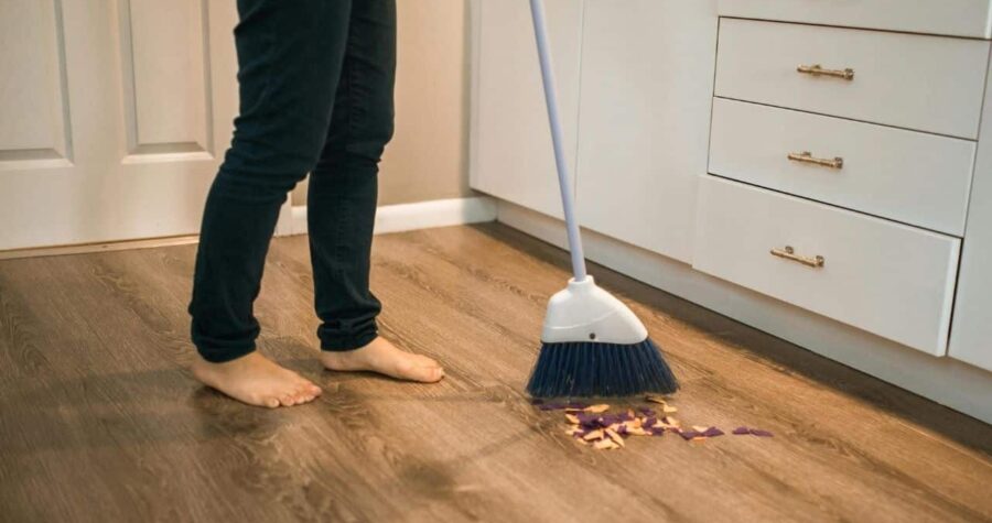 sweeping wood floor cleaning dust