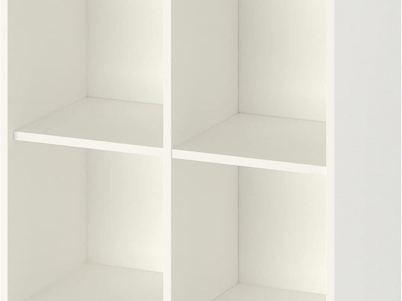 White four-cube storage shelf unit with two rows and two columns of open compartments