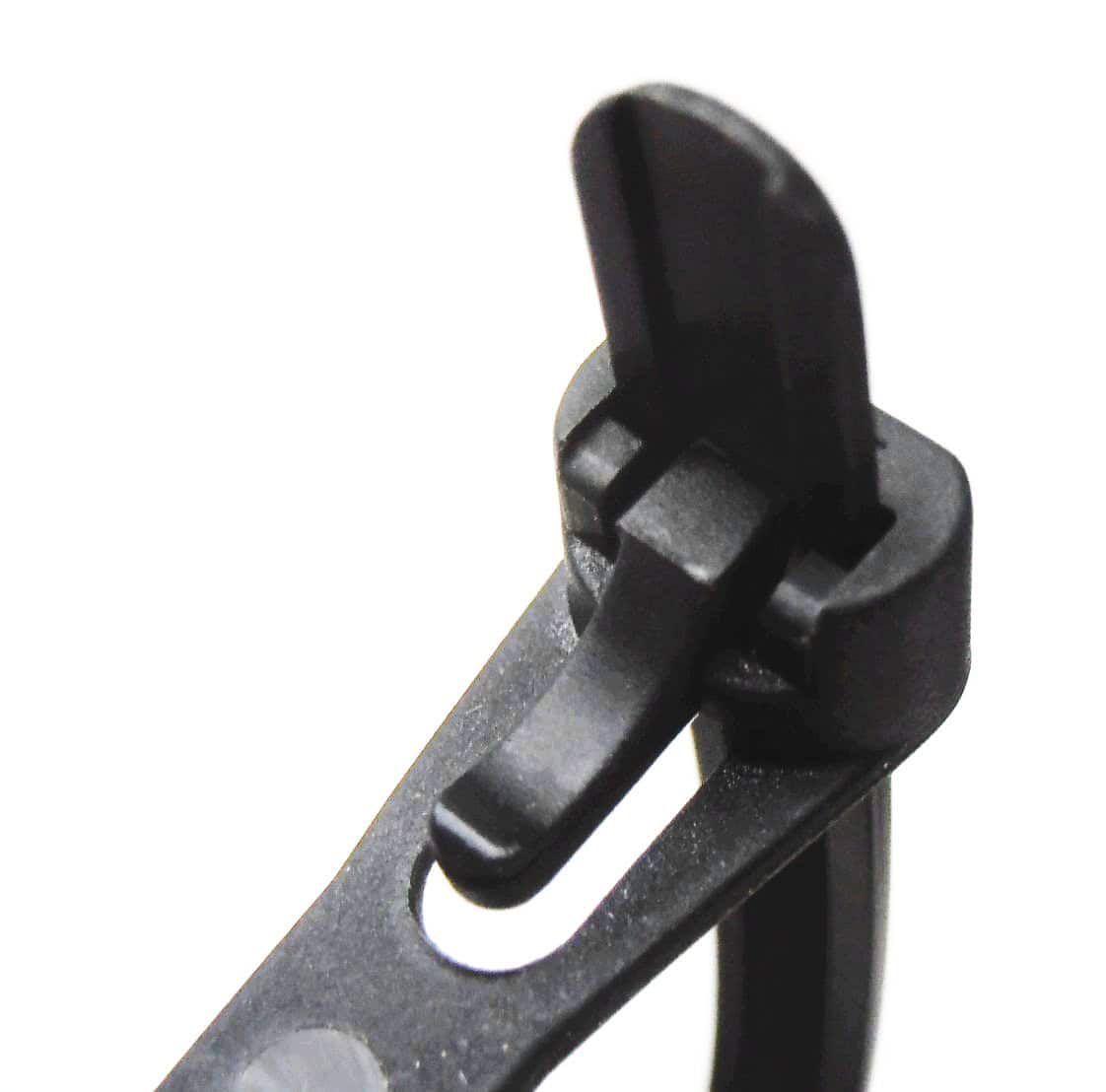 Bundle of cable ties, plastic material, various sizes or colors, neatly arranged or scattered