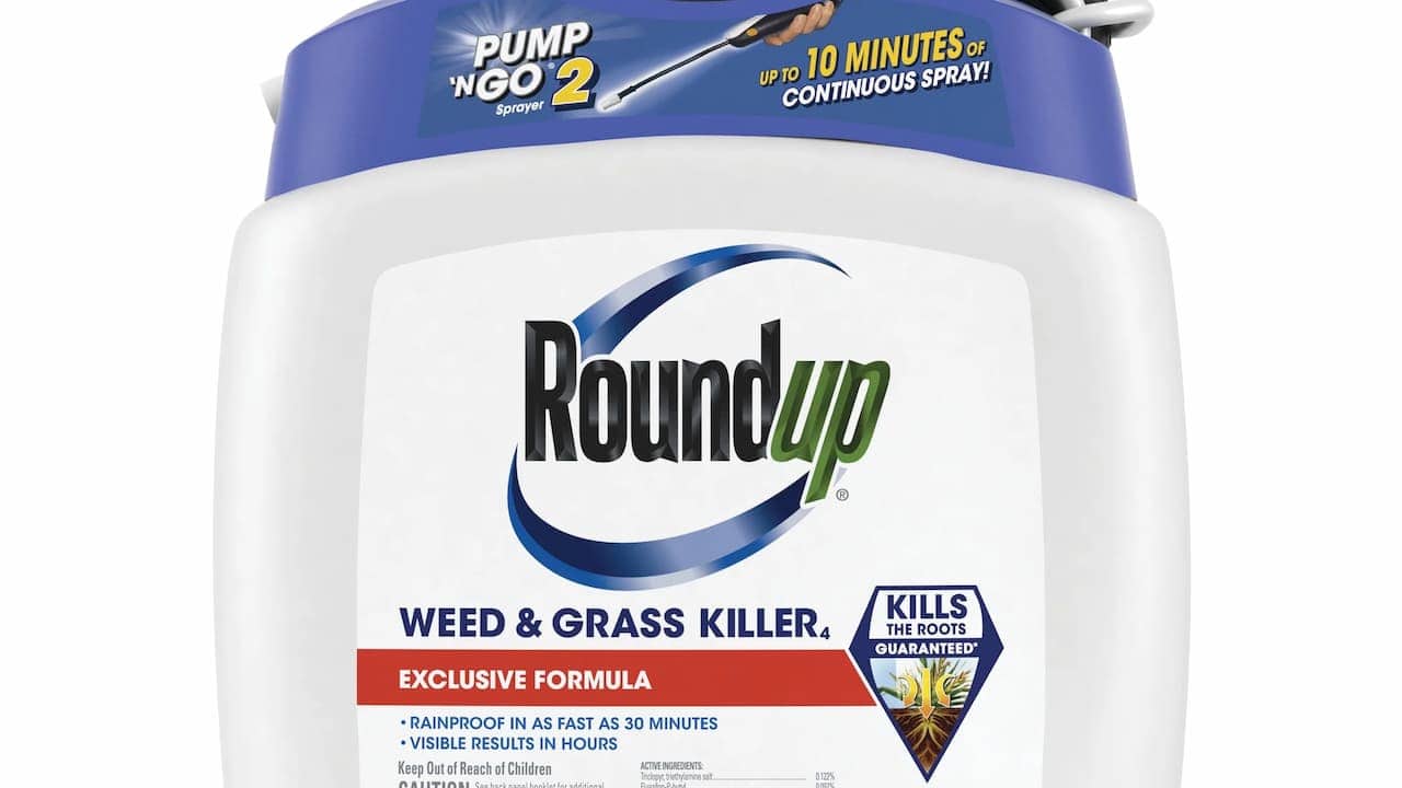 A bottle of Roundup Ready-To-Use Weed & Grass Killer with a spray nozzle