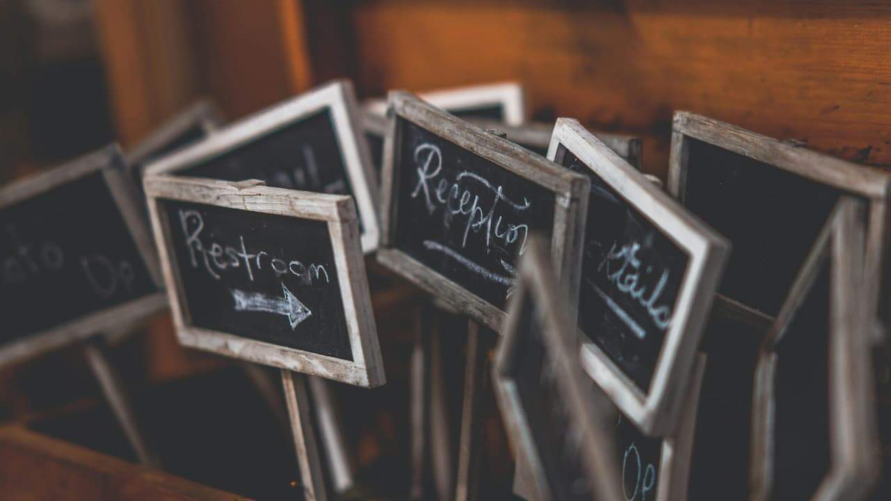 Chalkboard labels, black matte surface, adhesive backing, various shapes and sizes, writable with chalk or chalk markers