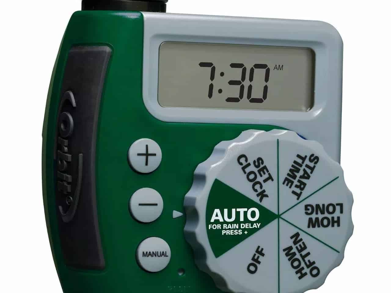 Orbit hose end timer attached to an outdoor faucet