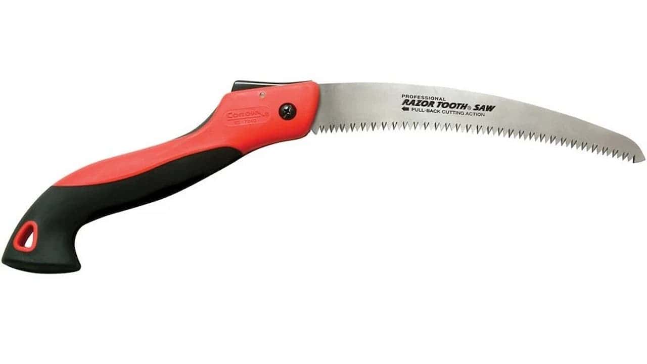 Corona RazorTOOTH folding saw with red and black ergonomic handle and curved serrated blade on white background