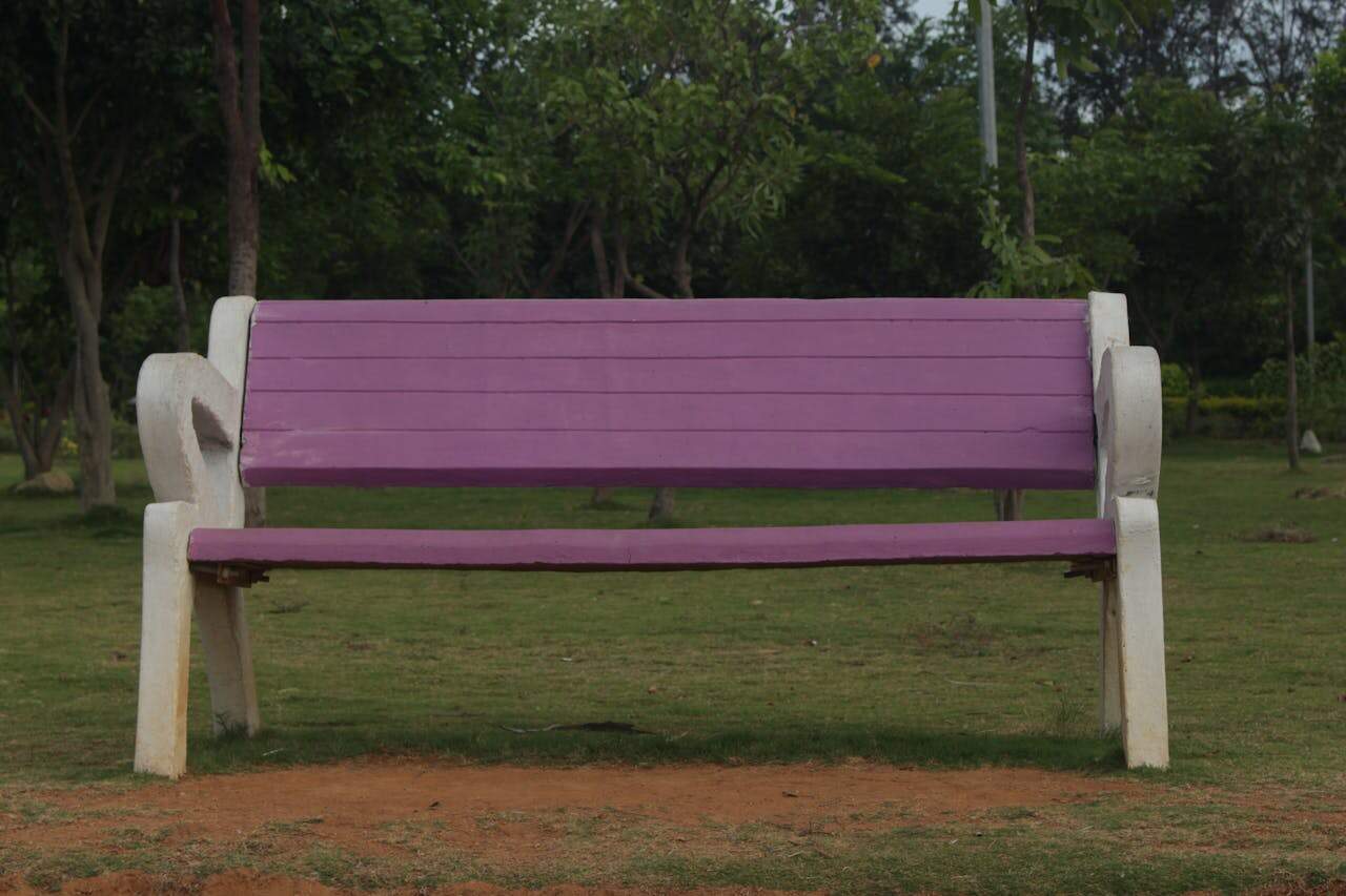 Vibrant Pink Bench in Tranquil Park Environment