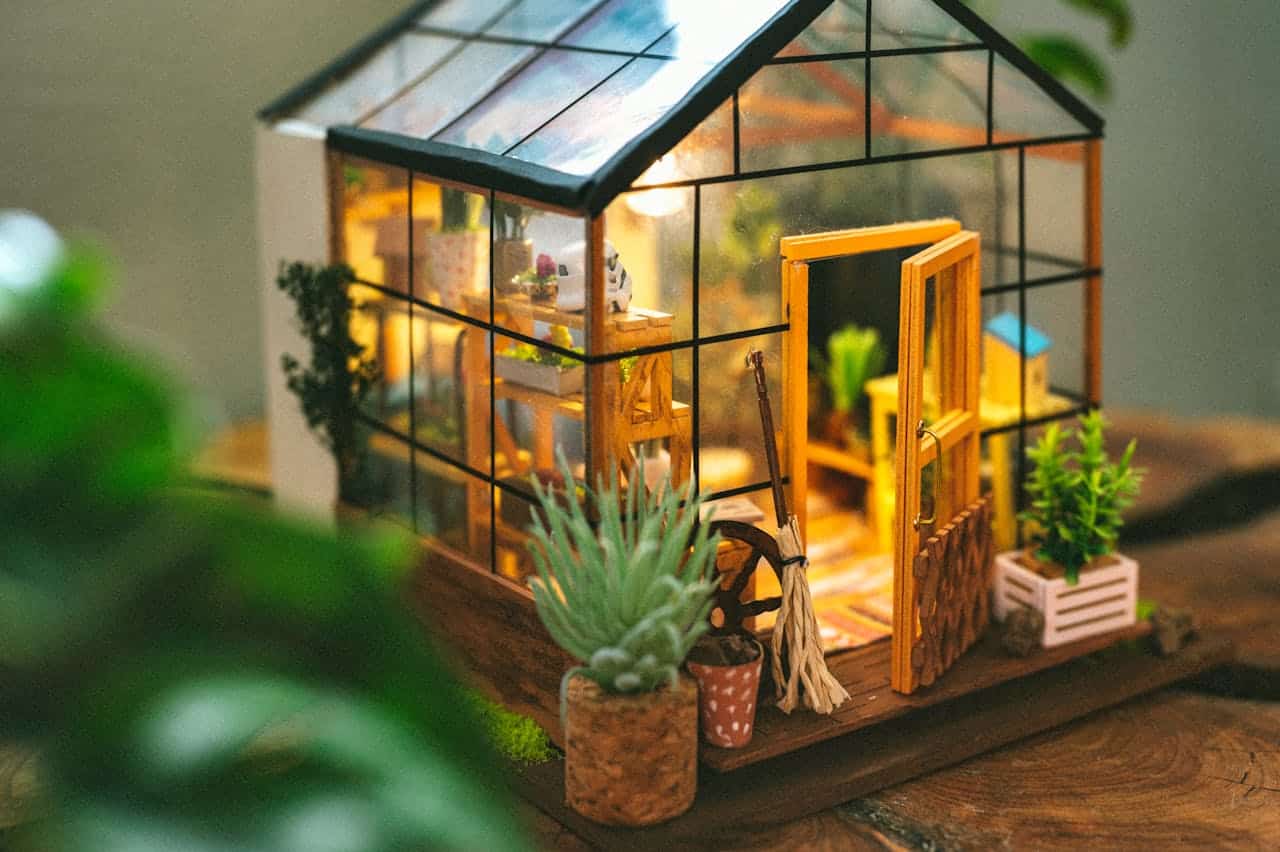 Close-Up Photo of a Wooden House Miniature