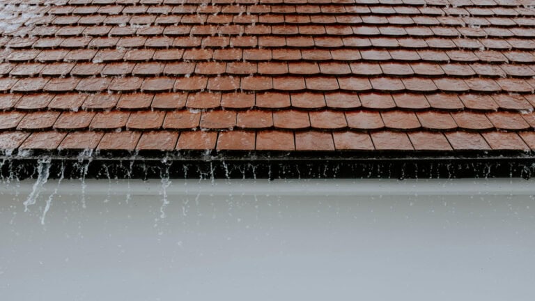 Roof and gutter in the rain
