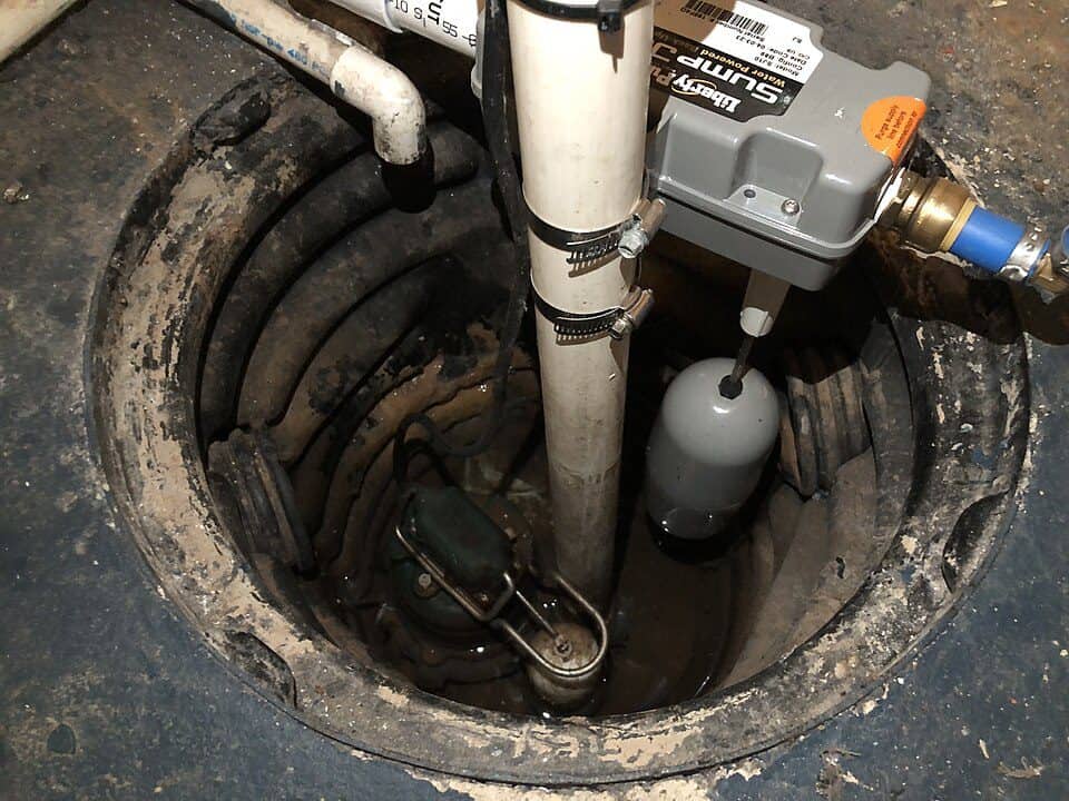 A newly-installed sump pump in the basement of a house along Aquetong Lane in the Mountainview section of Ewing Township, Mercer County, New Jersey