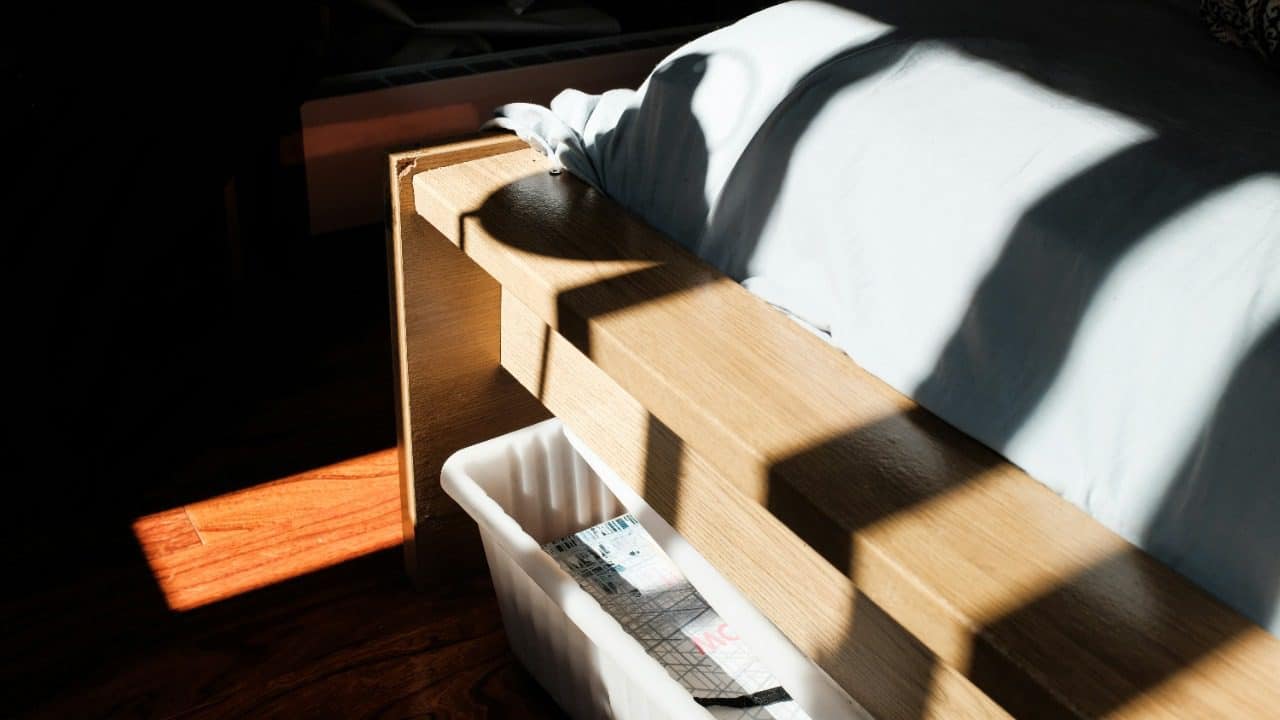 white textile on brown wooden table