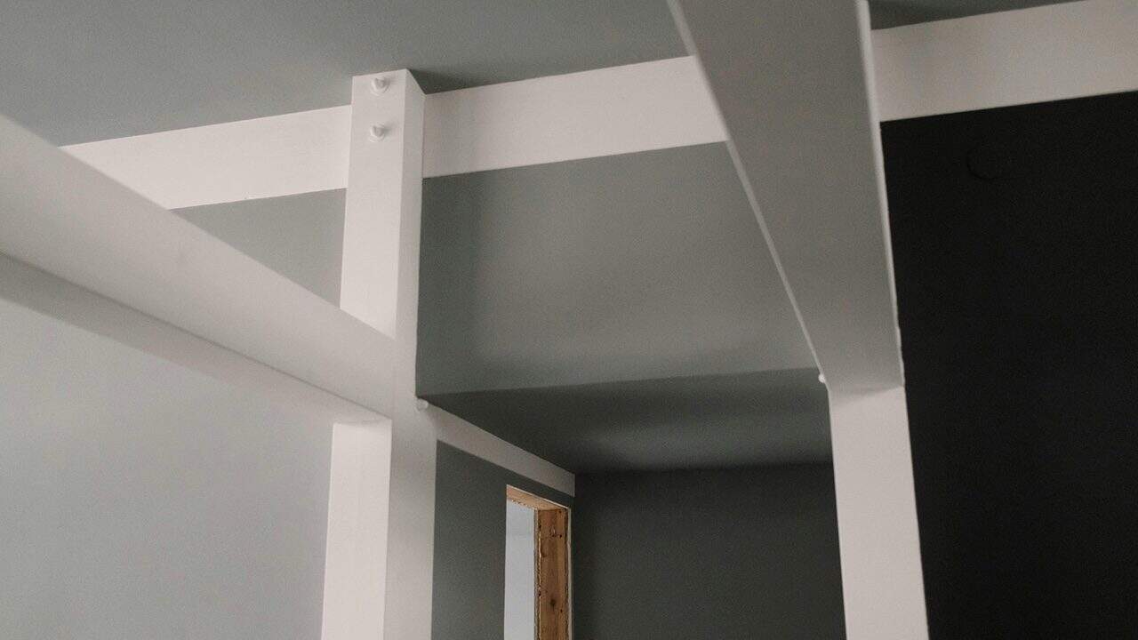 White ceiling beams