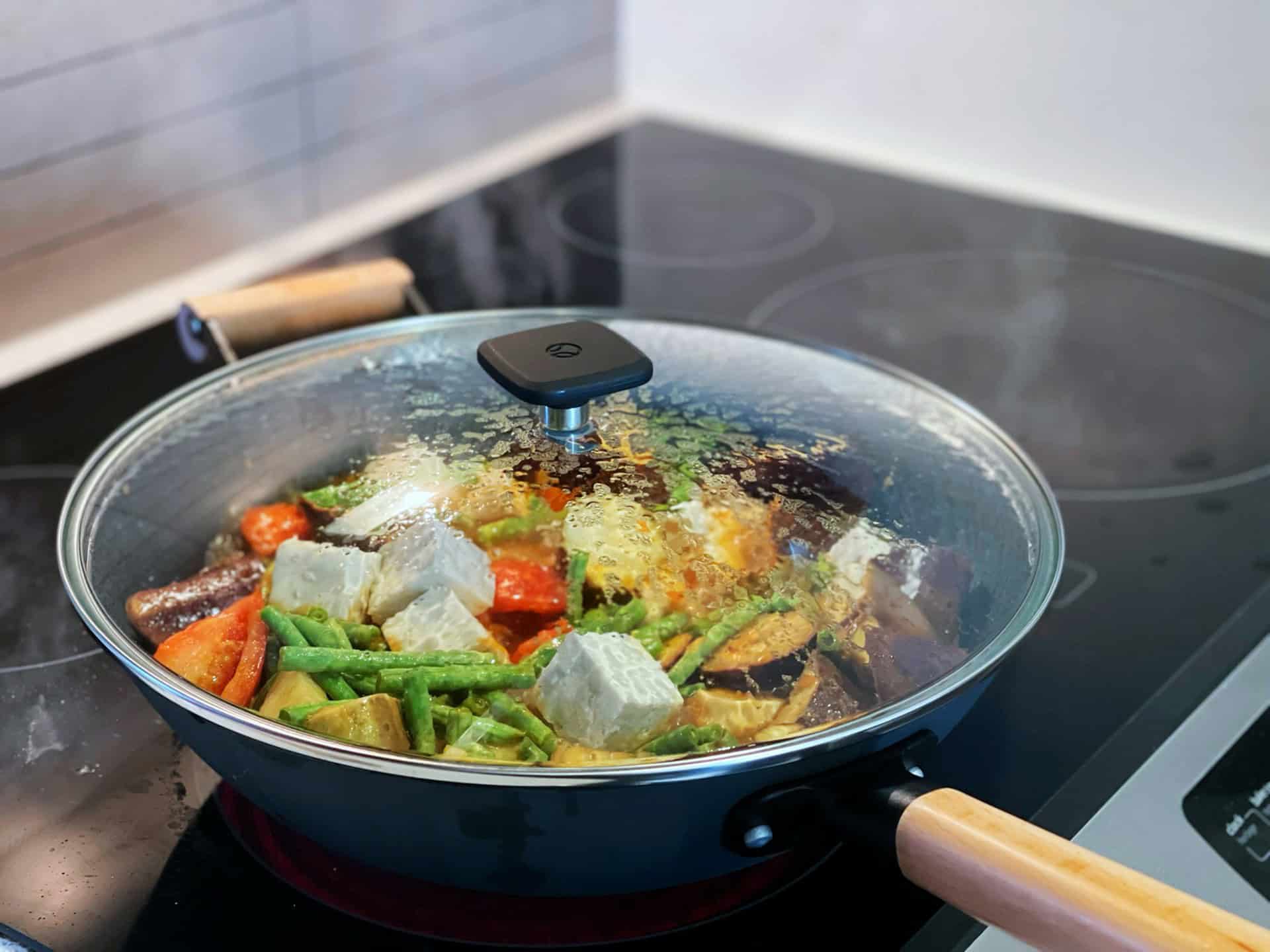 pan of food cooking on a stove top