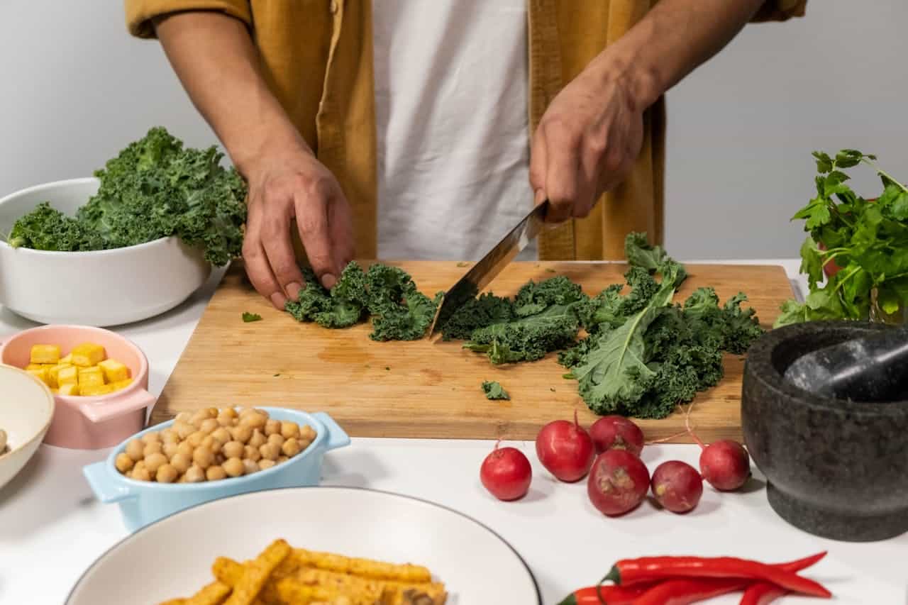Man Preparing Dinner in a Kitchen