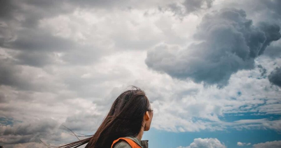 Woman Wearing Orange and Grey Top